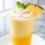 creamy mango pineapple tropical smoothie - featured image