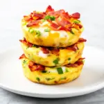 crispy air fryer bacon and cheese egg bites - featured image